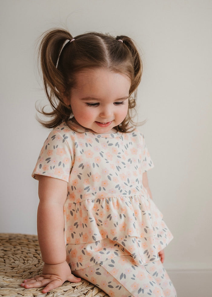 PEACHY FLORAL PEPLUM TOP