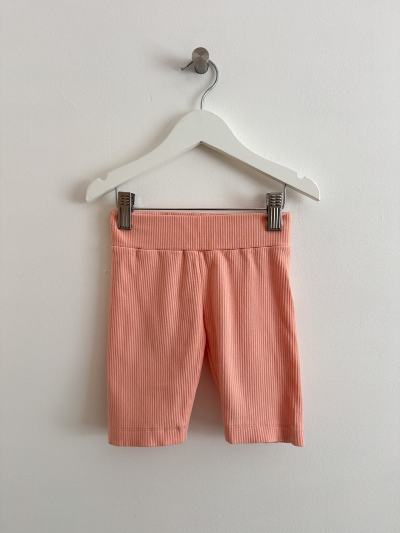 PRELOVED PEACH CYCLING SHORTS 3-4 YEARS